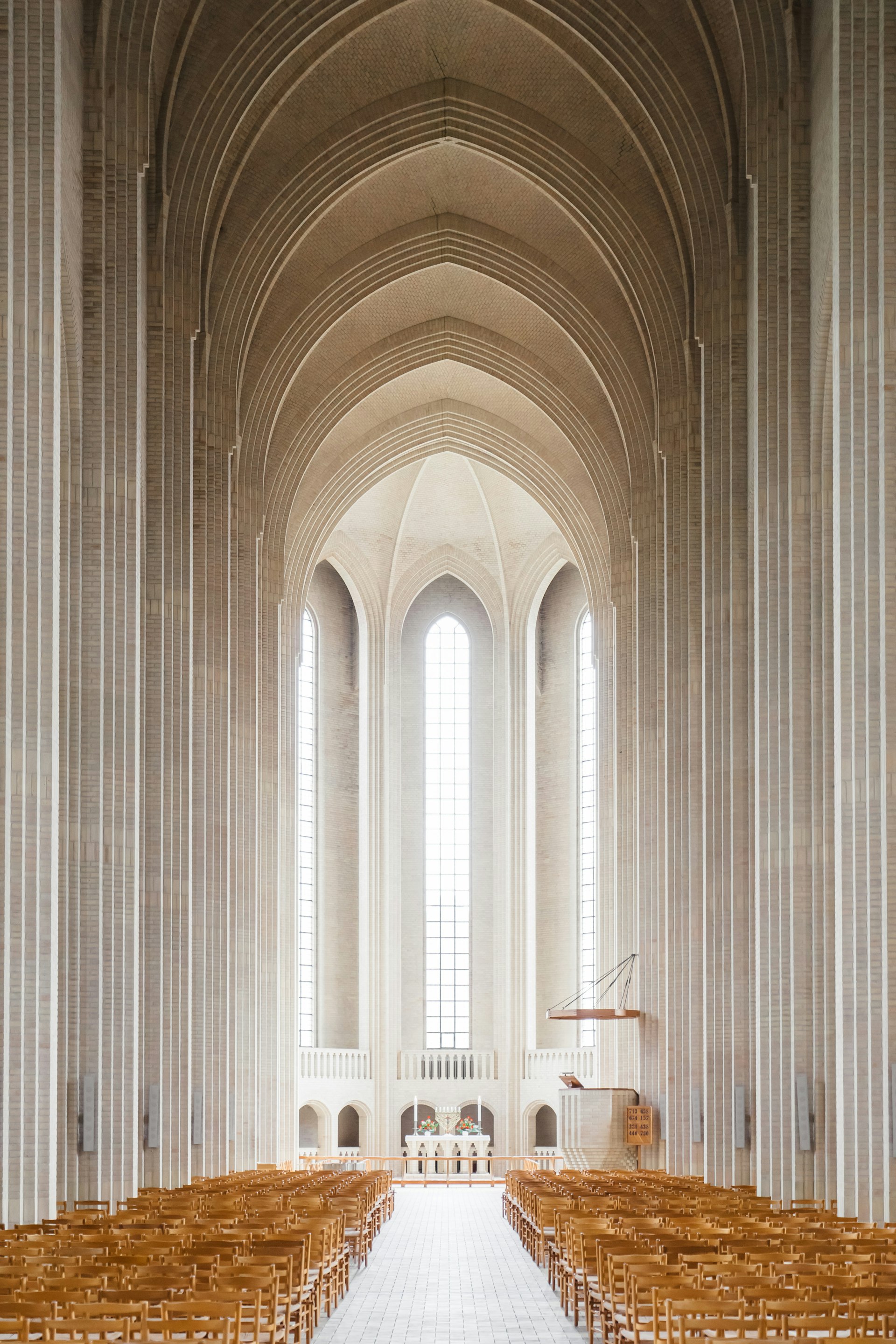 Light streaming through stained glass in a sanctuary